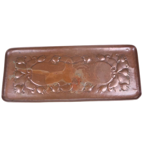 211 - A Newlyn School rectangular dressing table copper tray embossed with floral buds and a central carto... 