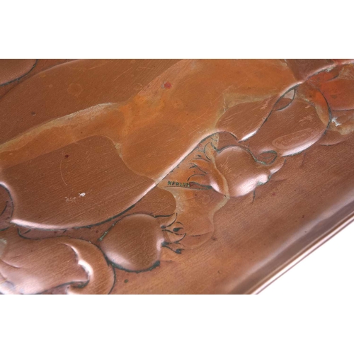 211 - A Newlyn School rectangular dressing table copper tray embossed with floral buds and a central carto... 