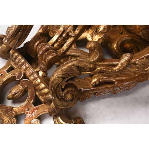 213 - A pair of carved wood and gilt gesso wall brackets with shaped marble tops, late 19th century/ early... 