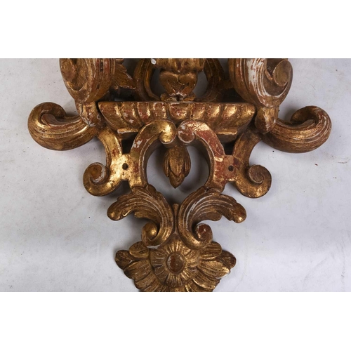 213 - A pair of carved wood and gilt gesso wall brackets with shaped marble tops, late 19th century/ early... 