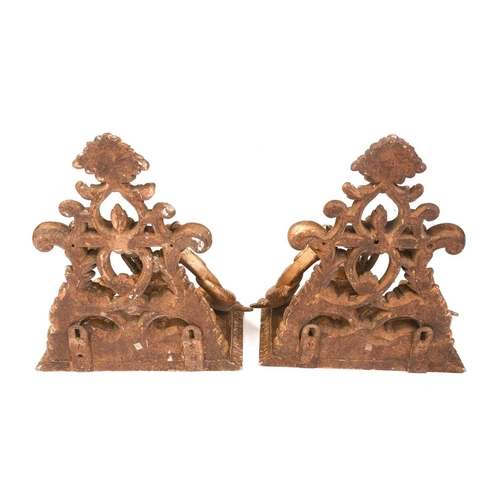 213 - A pair of carved wood and gilt gesso wall brackets with shaped marble tops, late 19th century/ early... 