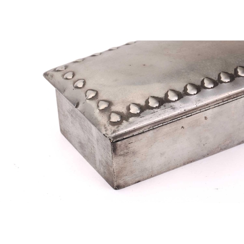 214 - A Liberty & Co of London Tudric rectangular wrought pewter cigarette box, the hinged top embossed wi... 