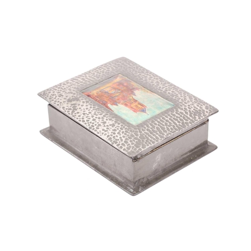 215 - A Liberty & Co (?) model 083 hammered pewter and hard enamel table box, the hinged cover set with a ... 