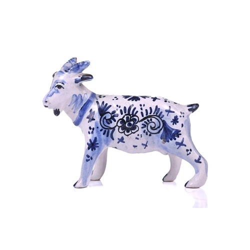 226 - A group of four Dutch delft animals, Late 18th/ early 19th century, modelled as three cows and a goa... 