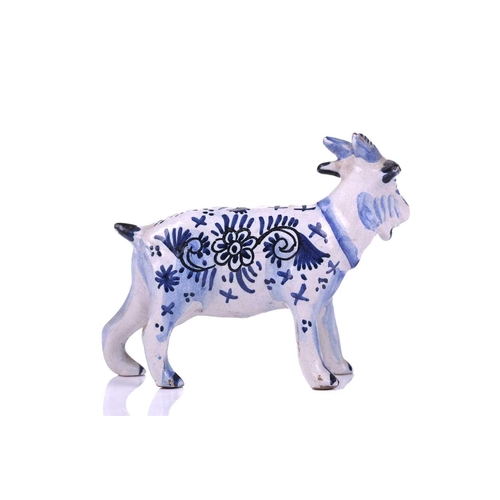 226 - A group of four Dutch delft animals, Late 18th/ early 19th century, modelled as three cows and a goa... 