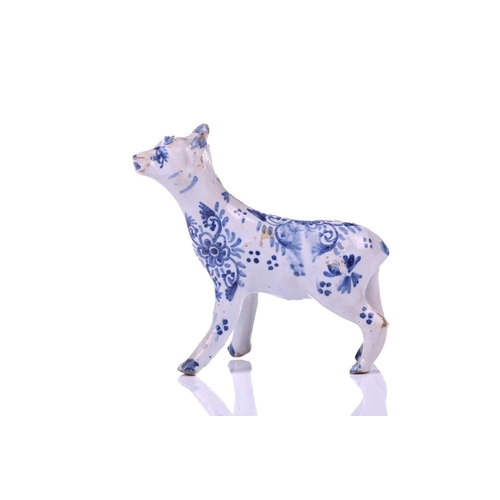 226 - A group of four Dutch delft animals, Late 18th/ early 19th century, modelled as three cows and a goa... 