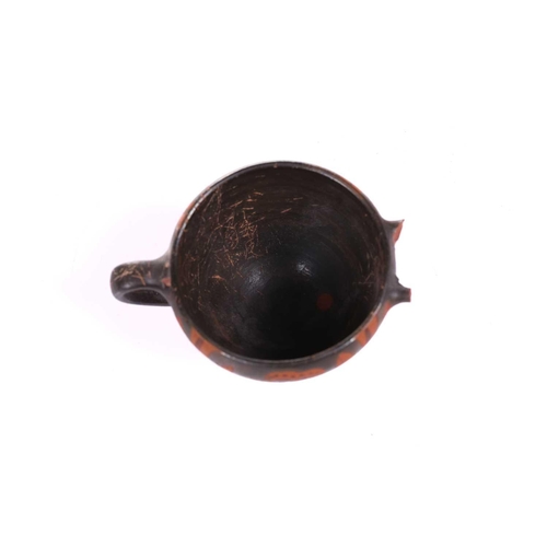 230 - An Athenian-style ritual cup, 4th century BC or later, decorated with the 