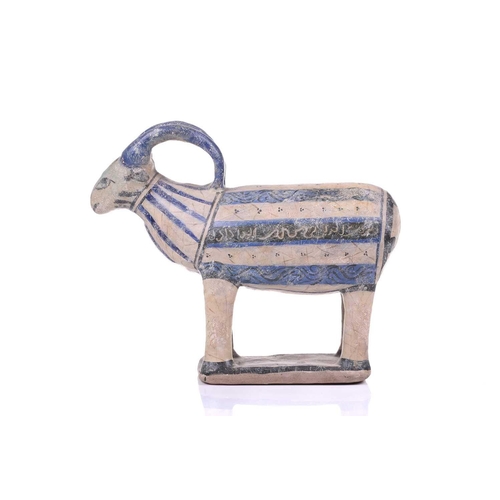 231 - An Islamic pottery ram, probably Iran, the cylindrical body decorated with bands of black and blue, ... 