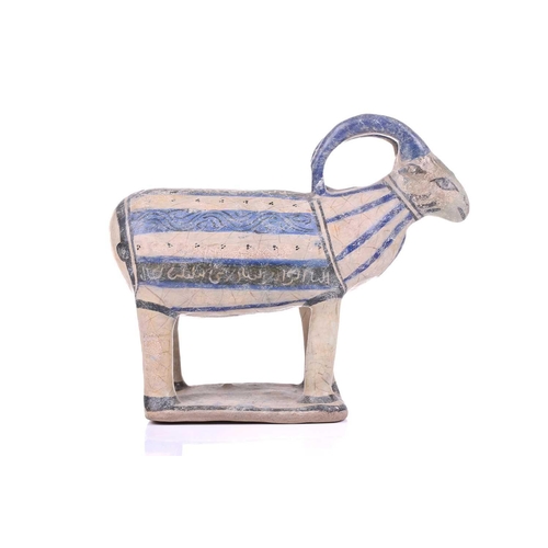 231 - An Islamic pottery ram, probably Iran, the cylindrical body decorated with bands of black and blue, ... 