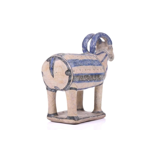 231 - An Islamic pottery ram, probably Iran, the cylindrical body decorated with bands of black and blue, ... 