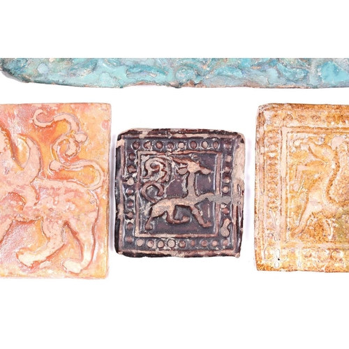 238 - A group of eight various Islamic tiles, 13th century and later, including a large turquoise glazed f... 