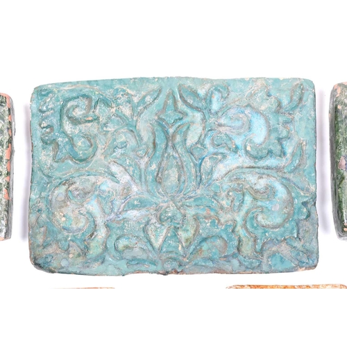 238 - A group of eight various Islamic tiles, 13th century and later, including a large turquoise glazed f... 