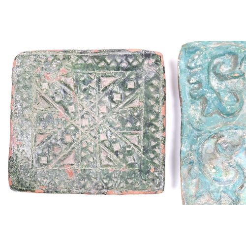 238 - A group of eight various Islamic tiles, 13th century and later, including a large turquoise glazed f... 