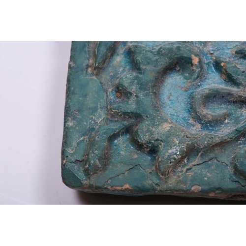 238 - A group of eight various Islamic tiles, 13th century and later, including a large turquoise glazed f... 