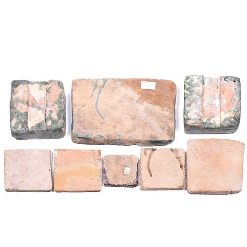 238 - A group of eight various Islamic tiles, 13th century and later, including a large turquoise glazed f... 