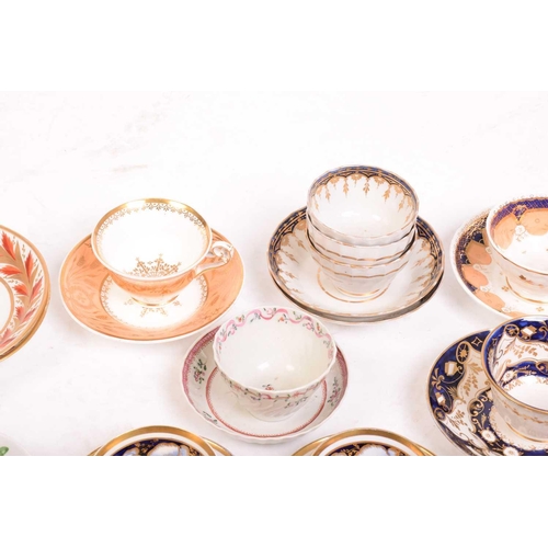 242 - A large collection of late 18th and 19th century English porcelain teacups, saucers and side plates,... 