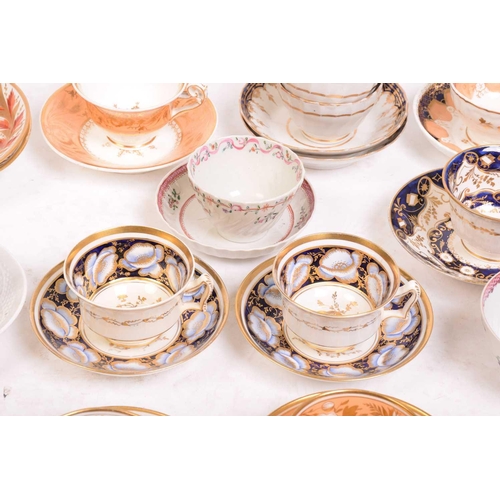 242 - A large collection of late 18th and 19th century English porcelain teacups, saucers and side plates,... 