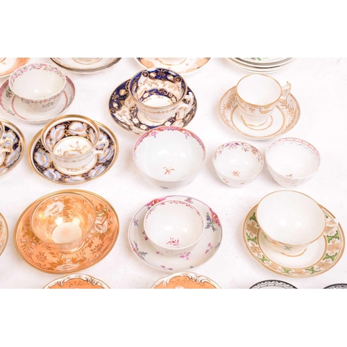 242 - A large collection of late 18th and 19th century English porcelain teacups, saucers and side plates,... 