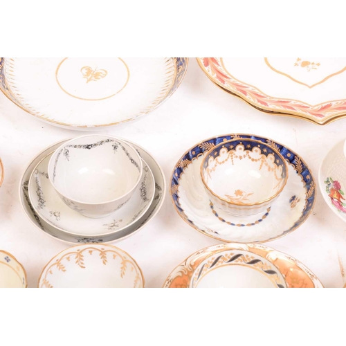 242 - A large collection of late 18th and 19th century English porcelain teacups, saucers and side plates,... 