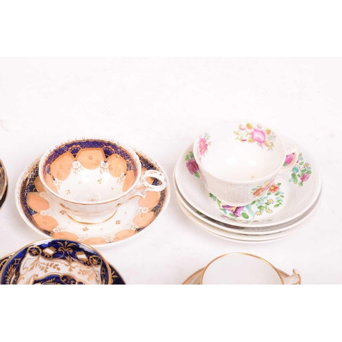 242 - A large collection of late 18th and 19th century English porcelain teacups, saucers and side plates,... 