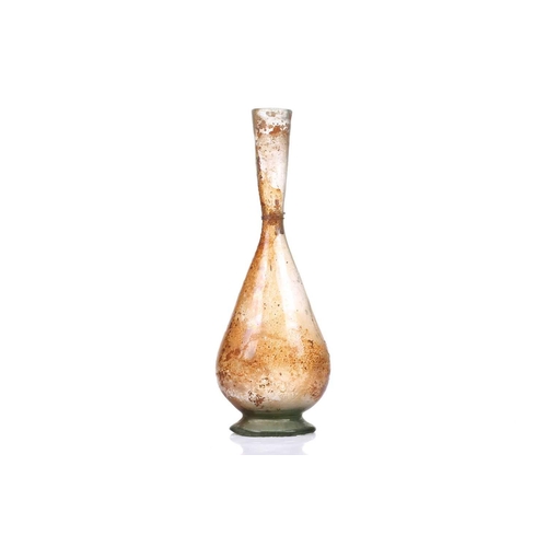 257 - A Roman glass inverted baluster form flask with trail decorated neck, bearing an old handwritten col... 