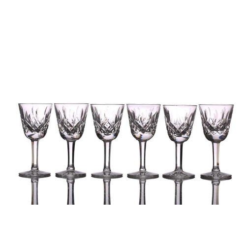 260 - A set of five Lismore design white wine drinking glasses, two with etched Waterford mark, 15 cm high... 