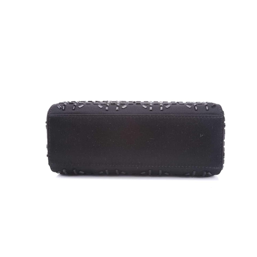 47 - Christian Dior - a mini Lady Dior evening bag in black satin, circa 2007, embellished with baguette-... 