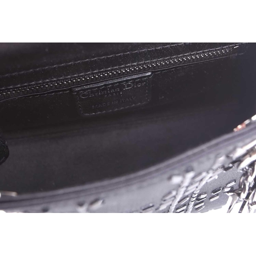 47 - Christian Dior - a mini Lady Dior evening bag in black satin, circa 2007, embellished with baguette-... 