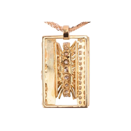 102 - A diamond set pendant, the rectangular plaque with a central band of seven graduated round brilliant... 