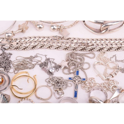 109 - A collection of assorted white metal jewellery including various bangles, bracelets necklace chains ... 