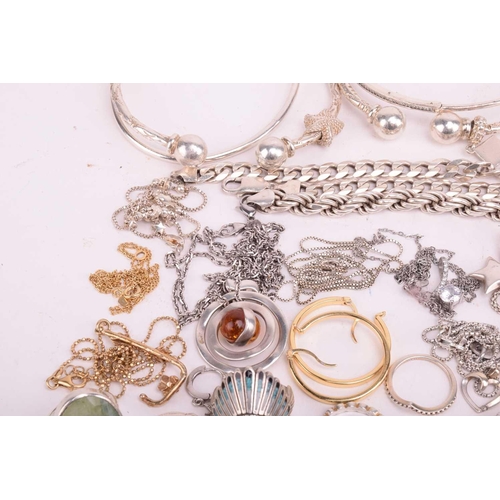 109 - A collection of assorted white metal jewellery including various bangles, bracelets necklace chains ... 