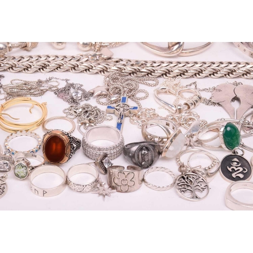 109 - A collection of assorted white metal jewellery including various bangles, bracelets necklace chains ... 