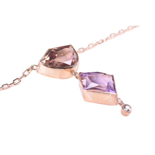 121 - A citrine, amethyst and diamond pendant necklace, set with a fancy cut ametrine and a kite shape ame... 