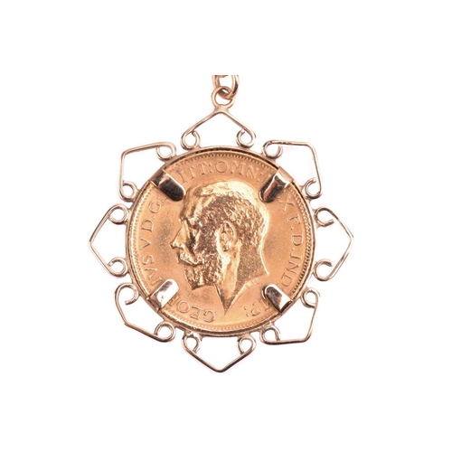 126 - A gold sovereign pendant necklace, the pendant set with a 1914 George V full sovereign, with a 9ct g... 