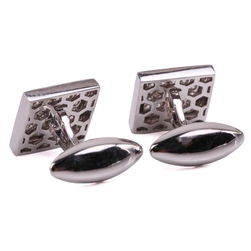 134 - A pair of diamond cufflinks, the square design set with round brilliant cut diamonds with a total es... 