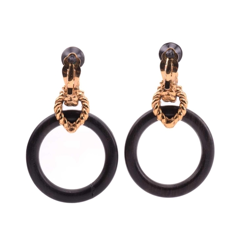 135 - Robert Goossens - two pairs of clip-on hoop earrings set with wood; the first pair of earrings each ... 