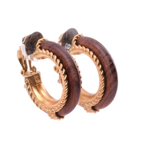 135 - Robert Goossens - two pairs of clip-on hoop earrings set with wood; the first pair of earrings each ... 