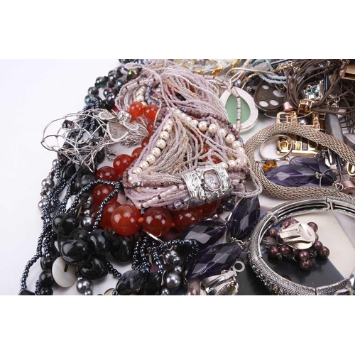 145 - A large quantity of costume jewellery including many pairs of clip-on and stud earrings, various wir... 