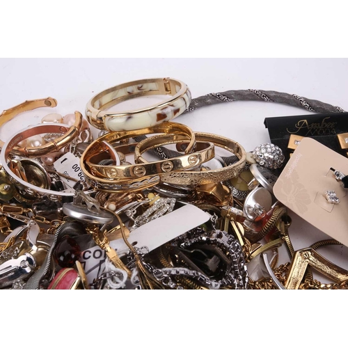 145 - A large quantity of costume jewellery including many pairs of clip-on and stud earrings, various wir... 