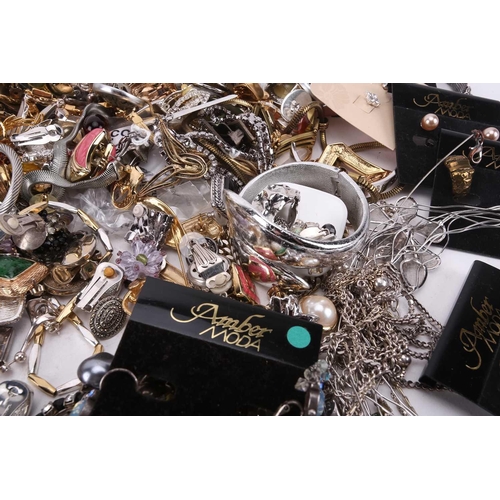 145 - A large quantity of costume jewellery including many pairs of clip-on and stud earrings, various wir... 