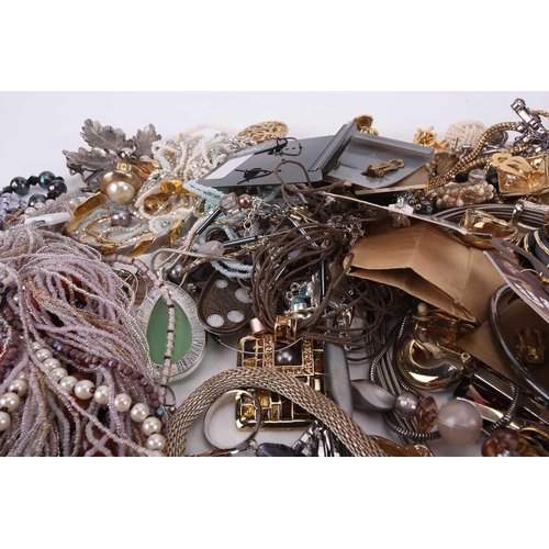 145 - A large quantity of costume jewellery including many pairs of clip-on and stud earrings, various wir... 