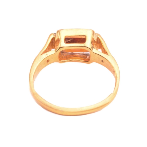 147 - A hessonite and diamond dress ring, an emerald-cut hessonite of 8.8 x 7.6 mm, in collet between diam... 