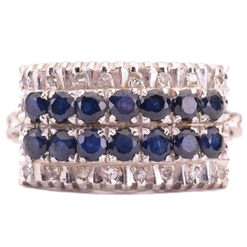 157 - A sapphire and diamond four-row half hoop ring, set with two rows of circular-cut sapphires with an ... 