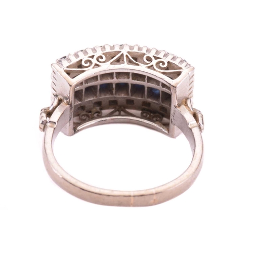 157 - A sapphire and diamond four-row half hoop ring, set with two rows of circular-cut sapphires with an ... 