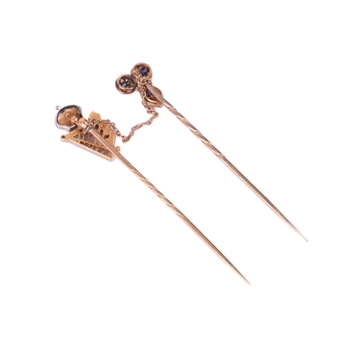 160 - Two diamond set stick pins; a crowned heart set with old cut diamonds, rose cut diamonds and enamel,... 