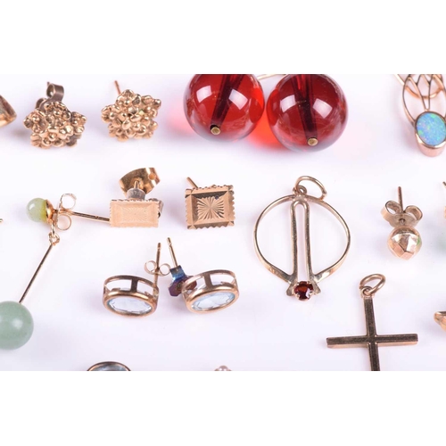 18 - A mixed collection of earrings together with a 9ct gold dolphin pendant, a 9ct gold cross and a spra... 