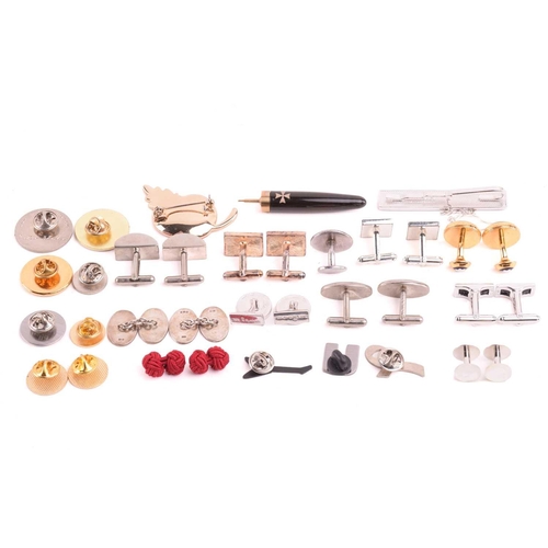 19 - An assortment of cufflinks and pins, including a pair of hallmarked silver oval cufflinks with an en... 