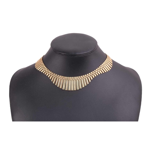 197 - A gold panther link necklace with elongated links forming an undulating outline, the necklace measur... 