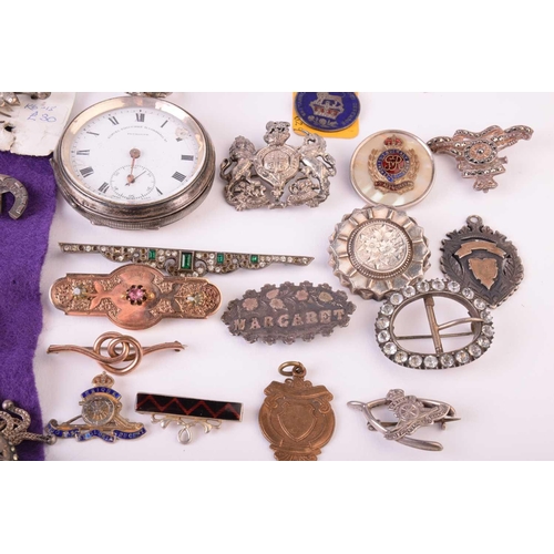 20 - A group of mixed military sweetheart brooches, cap badges and a silver an enamel RAF compact, togeth... 