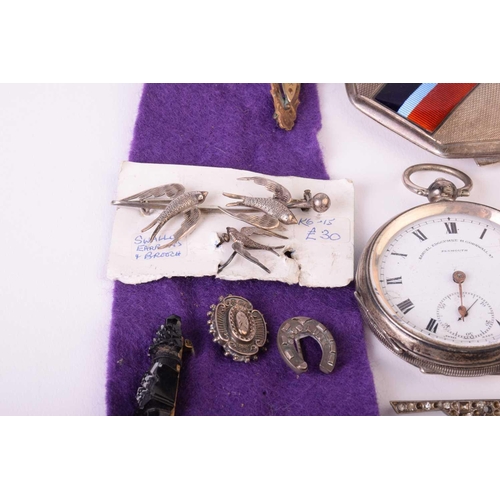 20 - A group of mixed military sweetheart brooches, cap badges and a silver an enamel RAF compact, togeth... 